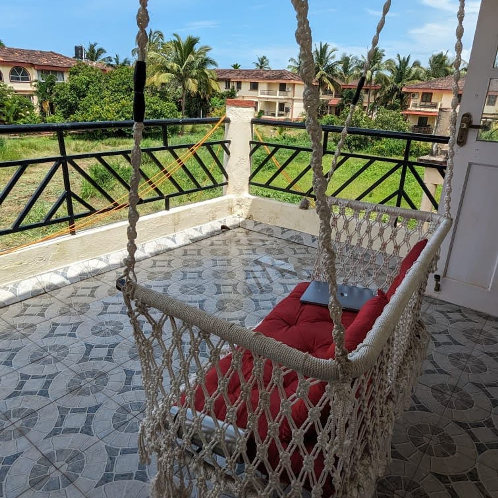 The balcony swing chair, looking out over the neighbourhood