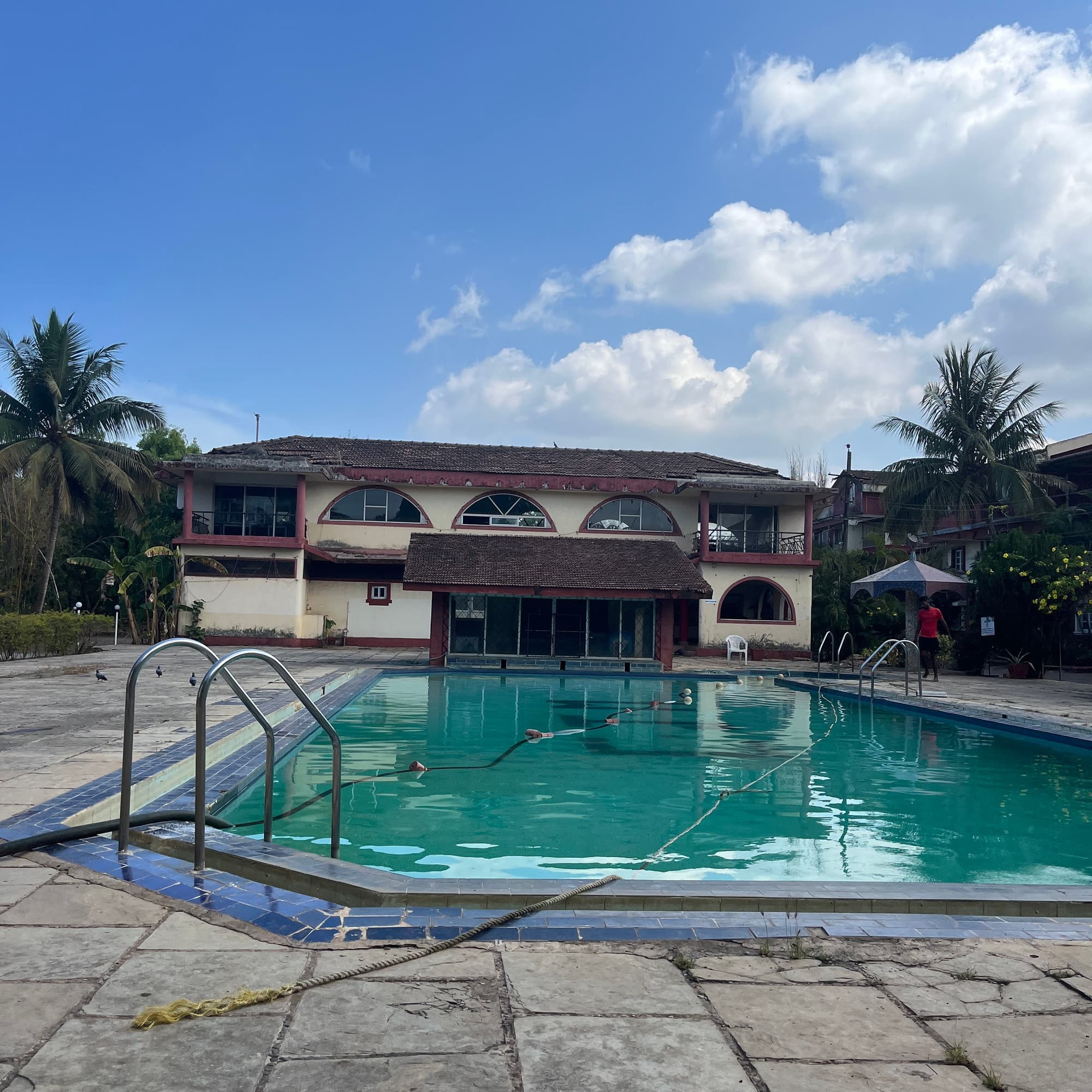 The shared pool from another angle, the old villa behind it
