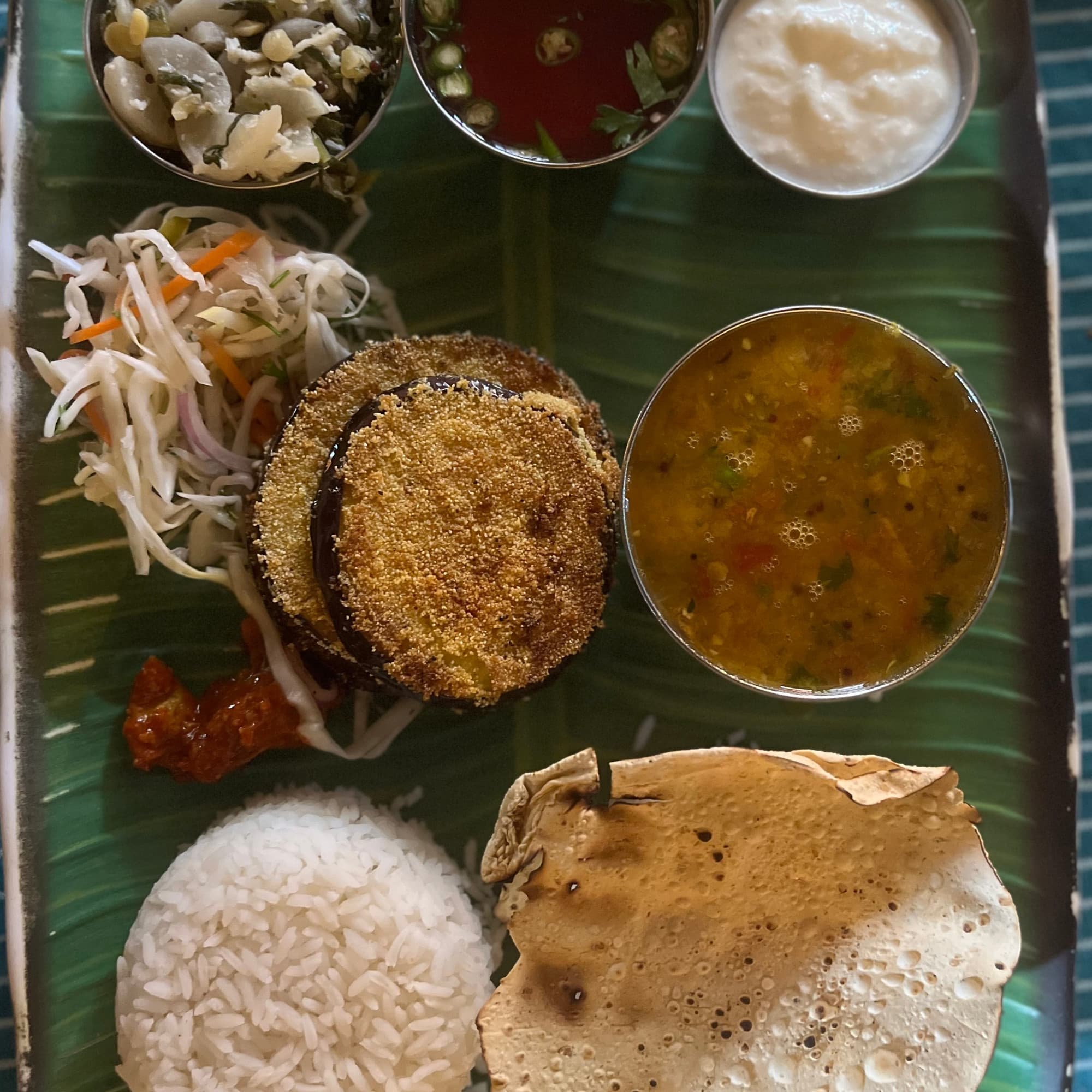 A full Goan thali, served banana-leaf style