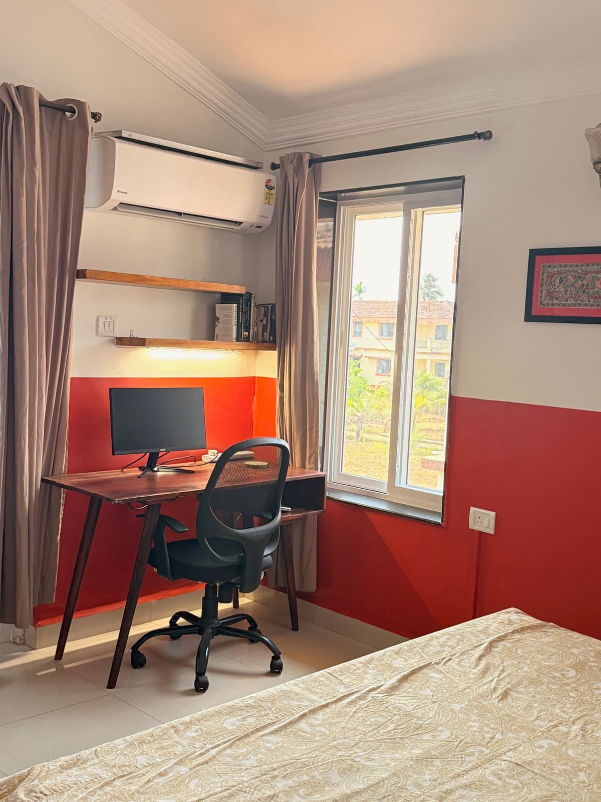 The Art Room's desk, monitor set up by the window